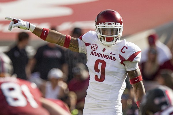 Arkansas safety Santos Ramirez motions prior to a snap during a game against South Carolina on Saturday, Oct. 7, 2017, in Columbia, S.C.
