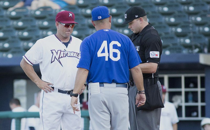 Northwest Arkansas Naturals manager Vance Wilson (left) was announced as the new bullpen coach for the Kansas City Royals on Tuesday. Wilson, a Springdale resident, managed the Naturals for four seasons and led them to three playoff appearances and two Texas League Championship Series berths.