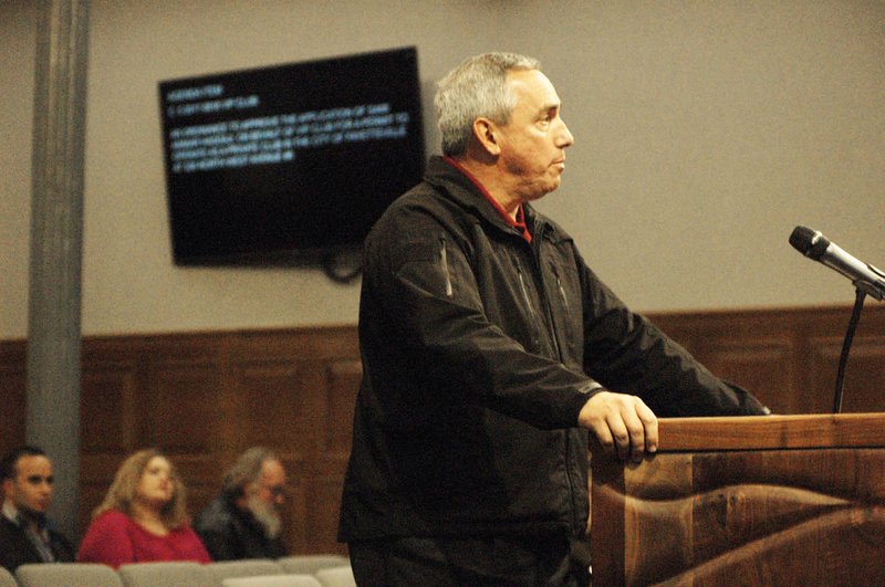 NWA Democrat-Gazette/STACY RYBURN Police Chief Greg Tabor speaks Tuesday to the Fayetteville City Council about violence in parts of the city's entertainment district.