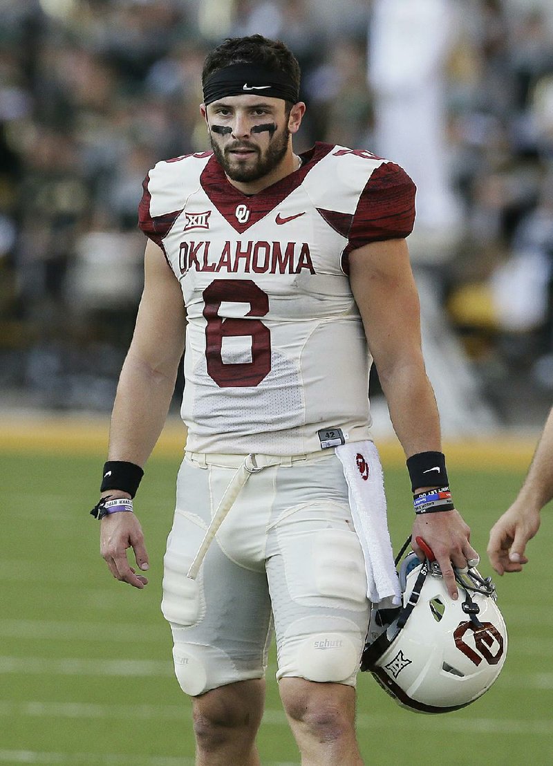 Oklahoma quarterback Baker Mayfield (6) walks the sideline during the second half of an NCAA college football game against Baylor in Waco, Texas, Saturday, Sept. 23, 2017. 