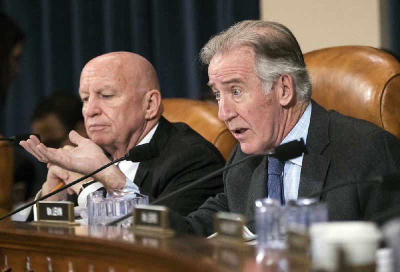 Rep. Richard Neal (right), D-Mass., the ranking member of the House Ways and Means Committee, discusses tax measures Wednesday. Committee chairman Rep. Kevin Brady (left), R-Texas, said last-minute changes in the measure likely will be made to meet deficit targets. Neal said Democrats would continue to offer amendments “till the last dog barks.” 