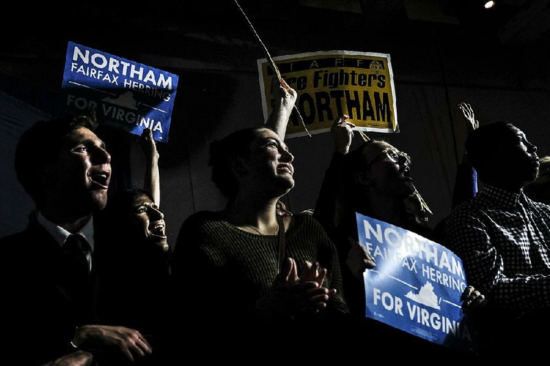 Supporters of Virginia Democratic Lt. Gov. Ralph Northam cheer Tuesday night after he won the race for governor over the Republican candidate, Ed Gillespie.     
 