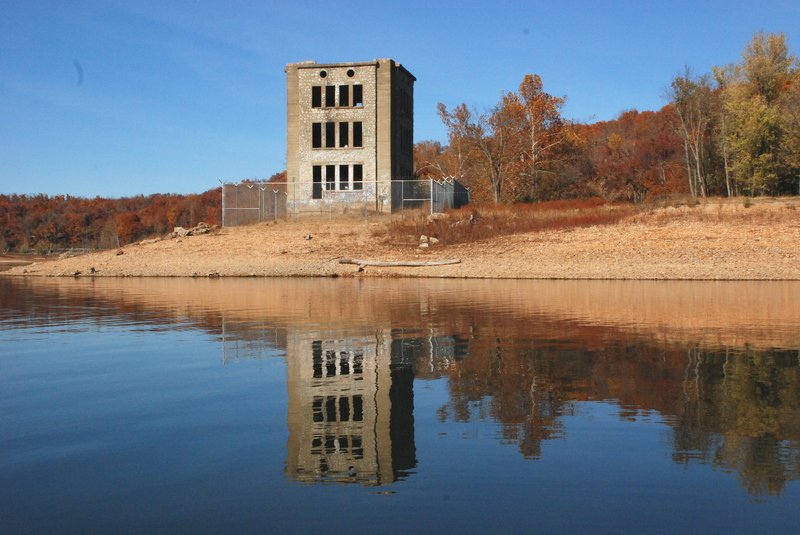 Courtesy photo The tower on the end of Oklahoma Row hotel still exists and can be seen today. When the hotel was built in 1909, the tower contained the luxury rooms overlooking Coin Harvey's lake. An eccentric millionaire, William "Coin" Harvey came to Rogers in 1900 and bought 320 acres of lush valley just four miles southeast of town to build his Monte Ne resort.