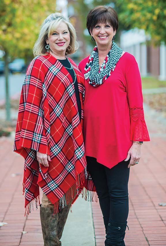 Amy Reed, left, director for development at Central Baptist College in Conway, and Pam Sims, personal enrollment officer, stand together on campus. They are co-chairwomen of the 16th annual Dazzle Daze, the Conway Regional Women’s Council’s annual fundraiser for the health system. The three-day shopping event is scheduled Thursday through Saturday at the Conway Expo Center.