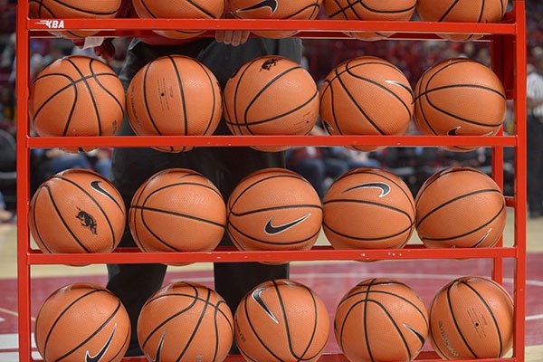 A rack of basketballs is shown during halftime of an exhibition game between Arkansas and Missouri Western on Friday, Nov. 3, 2017, in Fayetteville. 