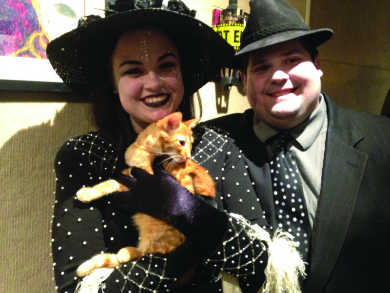Hannah and Rhett Davis hold their new cat Tony Chachere.
