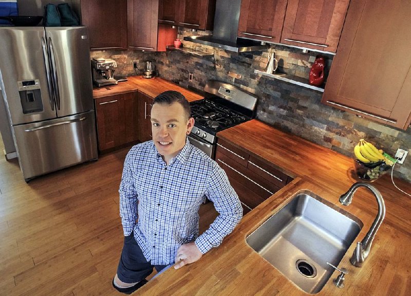 Jason Macom in his favorite space, his kitchen.