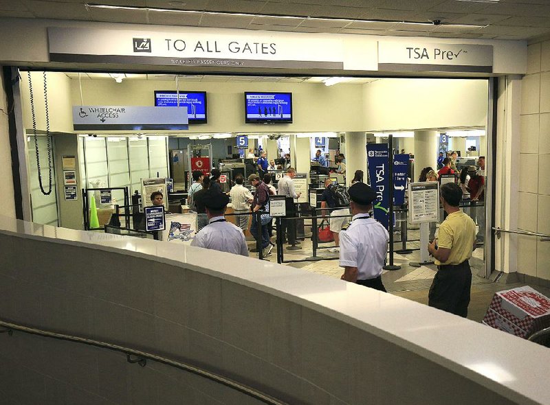 Bill and Hillary Clinton National Airport and other airports across the country have begun new security screening procedures that require travelers to put all electronics in bins.