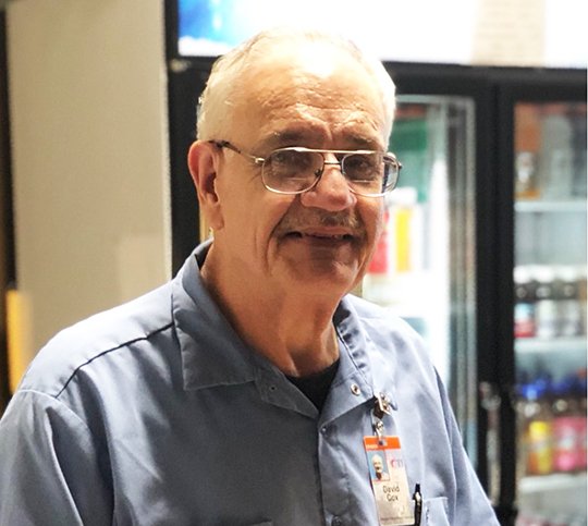 Submitted photo CONSUMER OF THE YEAR: David Cox, at his vending stand inside the Arkansas Career Training Institute, was recently named a DHS Division of Services for the Blind Hot Springs area Consumer of the Year.