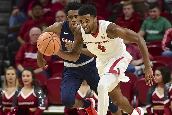 Arkansas guard Daryl Macon dribbles up the floor during a game against Samford on Friday, Nov. 10, 2017, in Fayetteville. 