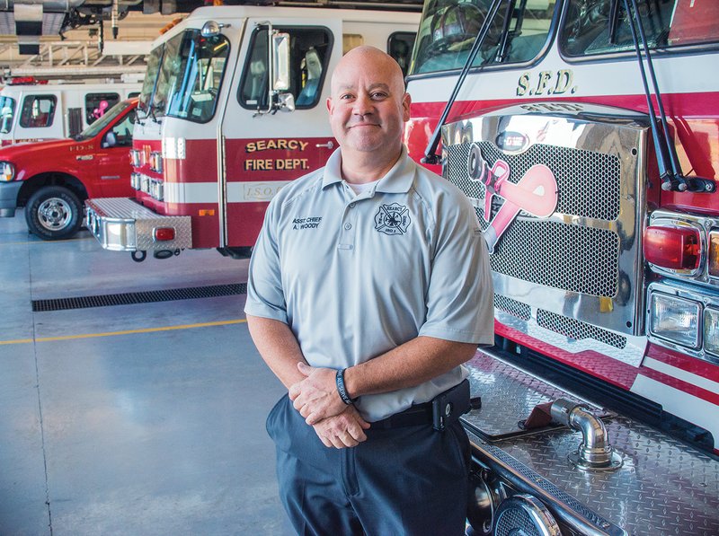 New Searcy Fire Chief Andy Woody stands in the fire station, a place where he has felt at home all his life. His father was also a fire chief, and as a child, Woody set his sights on the same career. The 40-year-old was hired to fill the position after longtime chief Bill Baldridge retired in September.