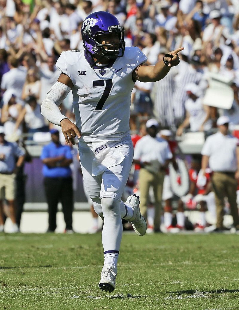 Quarterback Kenny Hill leads a balanced offense for the No. 6 TCU Horned Frogs into tonight’s game against the No. 5 Oklahoma Sooners in Norman, Okla. The winner will have sole possession of first place in the Big 12 Conference. 
