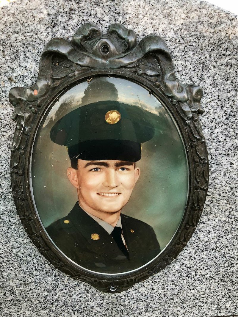 James Ledbetter’s Army photo is on his headstone.