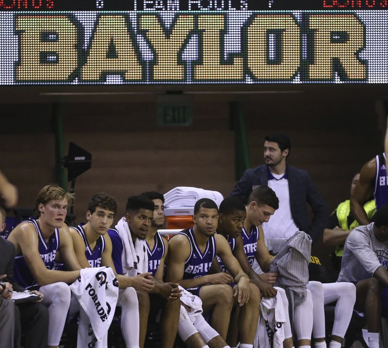The Central Arkansas bench watch in the second half of a NCAA college basketball game against Baylor, Friday, Nov. 10, 2017, in Waco, Tx. Baylor won 107-66. (AP Photo/Jerry Larson)