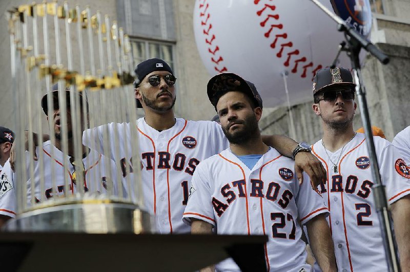The Houston Astros’ World Series trophy was damaged Wednesday at a charity function when someone got too close to the table on which it was displayed. The table collapsed and several of the flags on the trophy were bent.