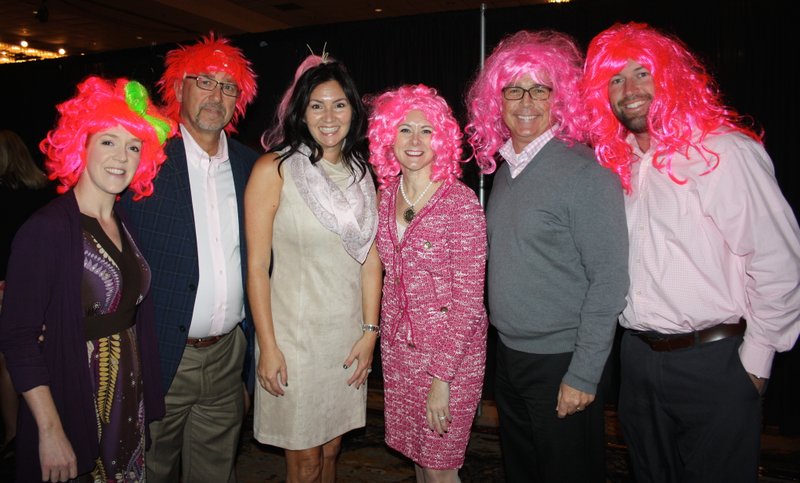 NWA Democrat-Gazette/CARIN SCHOPPMEYER Big Wigs Jennifer Marie Miller (from left), Kerry Bailey, Tracy Mitchell, Biggest Wig Marybeth Hays, Chris Lamson and Nick Nabholz help support Komen Ozark at the Pink Ribbon Luncheon on Oct. 27 at the Northwest Arkansas Convention Center in Springdale.