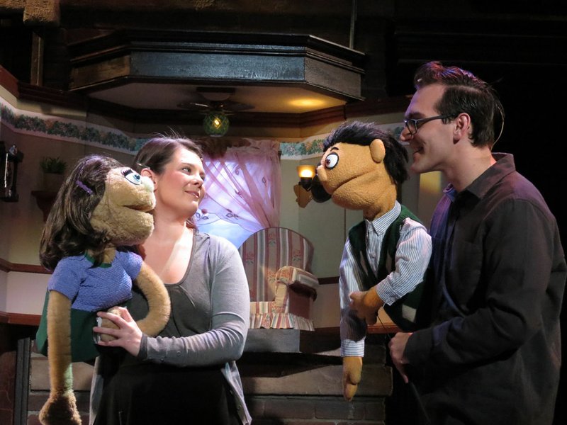 Halley Mayo is Kate Monster and Chandler Reid Evans is Princeton in the University Theatre production of “Avenue Q.” “I love my character, Kate Monster, and she is the puppet,” says Mayo. “So I guess I am attached to my puppet! I make jokes in rehearsal by asking, ‘Can you fall in love with a puppet?’” 
