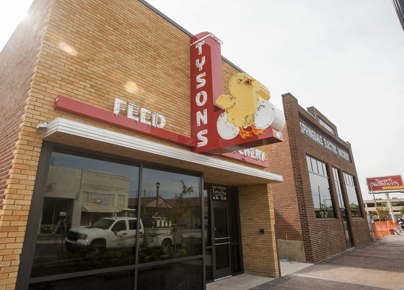 NWA Democrat-Gazette/BEN GOFF  @NWABENGOFF The new Tyson Foods building frontage in downtown Springdale along Emma bears the original looks of Tyson's original feed and hatchery and the Springdale Electric Hatchery.