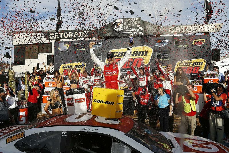 Matt Kenseth defeated Chase Elliott by 1.207 seconds to win the Cam Am 500 at Phoenix International Raceway in Avondale, Ariz.