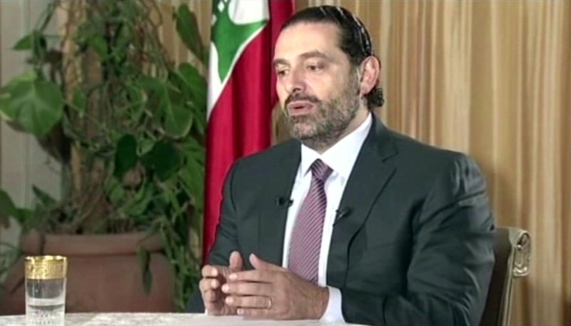 The Associated Press LEGANON: Lebanon's Prime Minister Saad Hariri gives a live TV interview Sunday in Riyadh, Saudi Arabia, saying he will return to his country "within days". During the live TV interview shown on Future TV, Harari said he was not under house arrest in Saudi Arabia, and that he intends to return to Lebanon to withdraw his resignation and seek a settlement with rivals in the coalition government, the militant group Hezbollah.