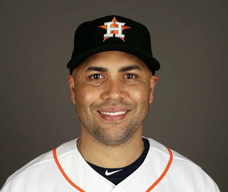 This is a 2017 file photo showing Carlos Beltran of the Houston Astros. Beltran is retiring after winning his first World Series title in his 20th major league season. The 40-year-old made the announcement Monday, Nov. 13, 2017, 12 days after the Astros beat the Los Angeles Dodgers in Game 7 of the World Series. 