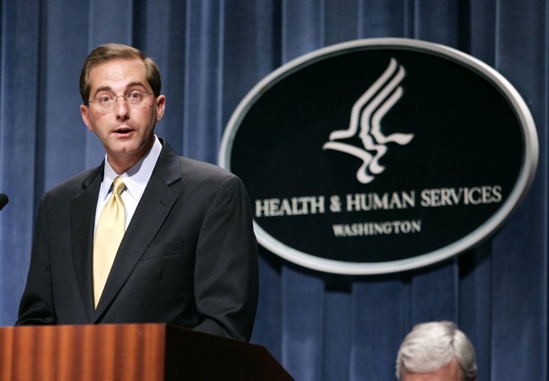 In this June 8, 2006 file photo, then Deputy Health and Human Services Secretary Alex Azar meets reporters at the HHS Department in Washington. Azar was a top HHS official during the George W. Bush administration. 