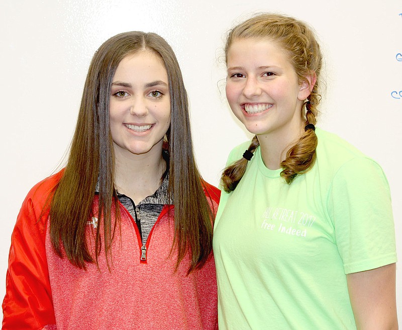 MARK HUMPHREY ENTERPRISE-LEADER Classmates Makenna Vanzant (left) and Joelle Tidwell were both promoted last season as freshmen to the Lady Cardinal varsity basketball squad. Each helped Farmington reach the State 5A semifinals in 2017 and both are expected to contribute as sophomores this year. Vanzant is recovering from a bout with Hemolytic Uremic Syndrome that landed her in the hospital for 16 days.