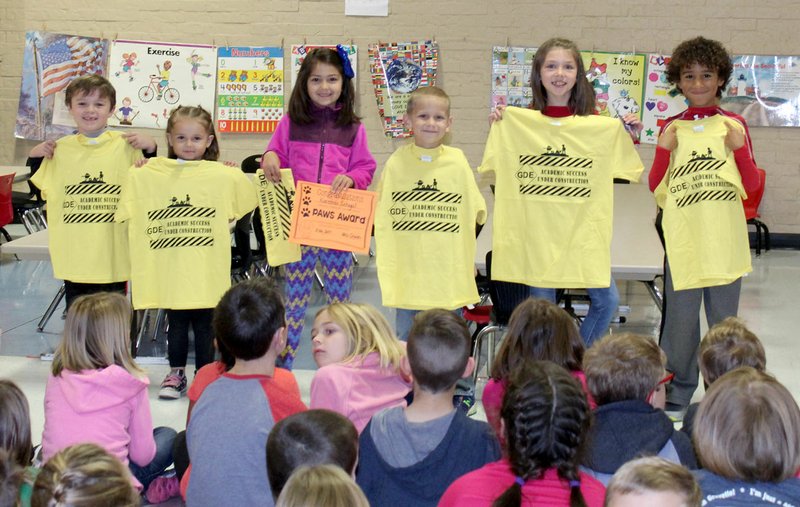 Submitted Photo "Pawsitive" and Wise Student (PAWS) award winners at Glenn Duffy Elementary School were recognized at the school's monthly Rise and Shine assembly. Each winner was presented a certificate and a T-shirt. Grade-level PAWS winners for November are Brady Brewer (left), Charleigh McGee, Kareena Sehgal, Wyatt Berger, Kailyn Deady and Luke Martin.