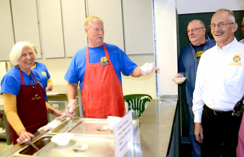 Janelle Jessen/Herald-Leader Civitan members Awynne Thurstenson and Steve Thomas served soup to Bennie Gallant and Charles Adams during the annual Civitan Soup Sampler fundraiser, held Friday at Community Christian Fellowship.