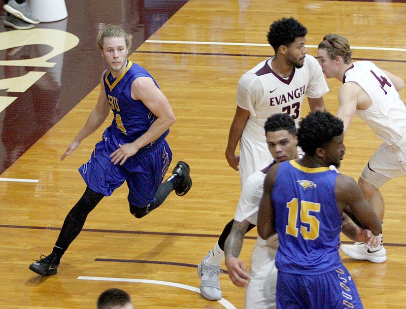 Photo courtesy of Evangel University John Brown University junior Jake Caudle, left, scored a career-high 38 points as the Golden Eagles knocked off Evangel (Mo.) 95-91 on Saturday in Springfield, Mo.