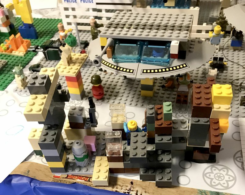 Photo by Tina Crose Garrett May, 9, of Gravette, took first place in the fifth annual Great Lego Build-Off at Imagine Before and After School Care Nov. 11 with an elaborate model he titled &quot;Zombie Apocalypse.&quot; Garrett received a hat, Lego cup and a set of Legos.