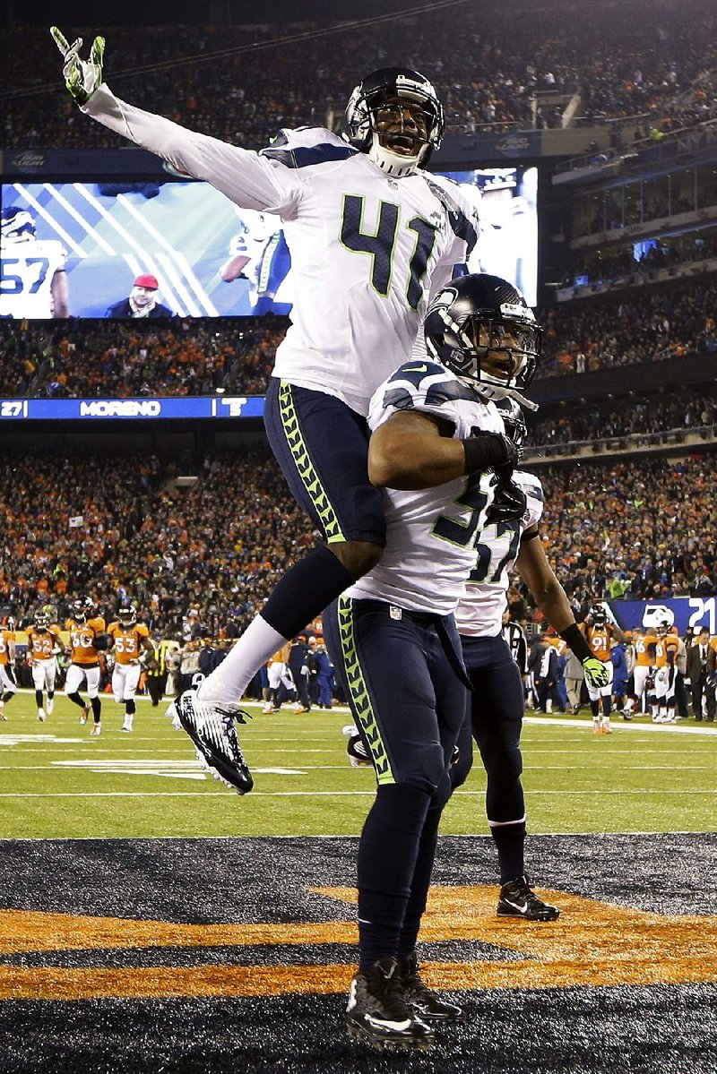 Byron Maxwell (top) returns to Seattle after spending the past three seasons with Philadelphia and Miami. Maxwell was added after the Seahawks lost cornerback Richard Sherman with a torn Achilles. 