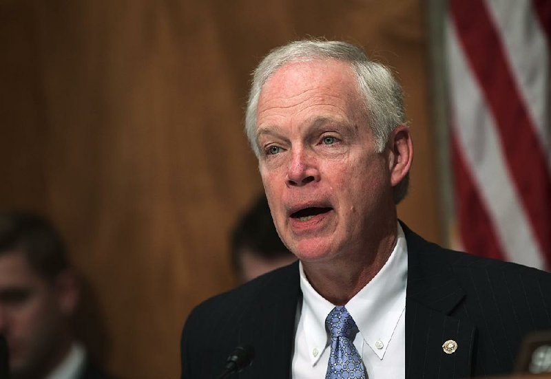 Senate Governmental Affairs Committee Chairman Sen. Ron Johnson, R-Wis., speaks on Capitol Hill in Washington, Tuesday, Oct. 31, 2017. 