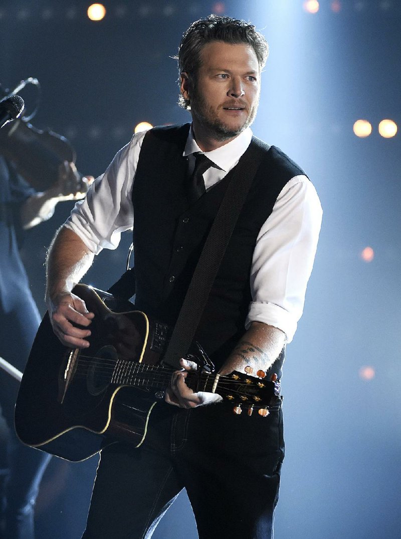 In this Nov. 4, 2015 file photo, Blake Shelton performs at the 49th annual CMA Awards in Nashville, Tenn. Shelton was named as People magazine's 2017 "Sexiest Man Alive." 