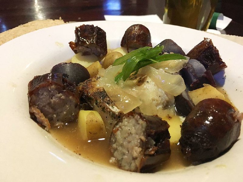 The Dublin Coddle, new on the menu at Dugan’s Pub, features pan-seared Pacific cod, Irish bangers, fingerling potatoes and onions in a bacon broth. 