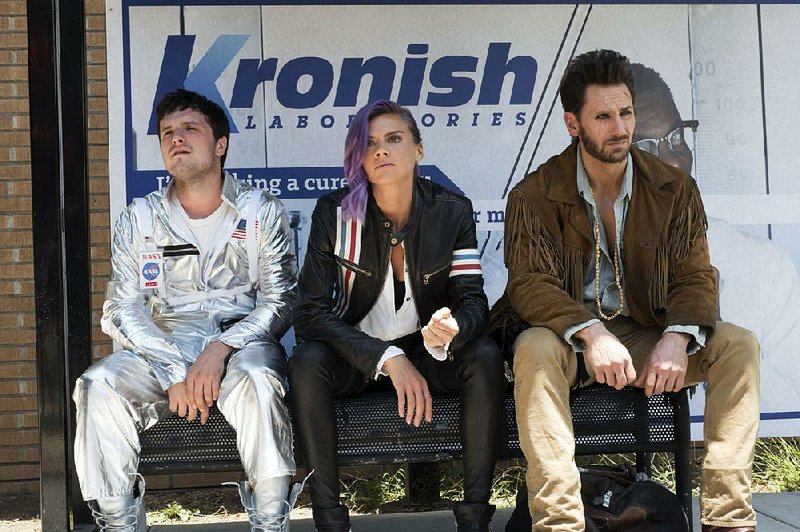 Future Man, Hulu’s latest original comedy, stars (from left) Josh Hutcherson, Eliza Coupe and Derek Wilson.
