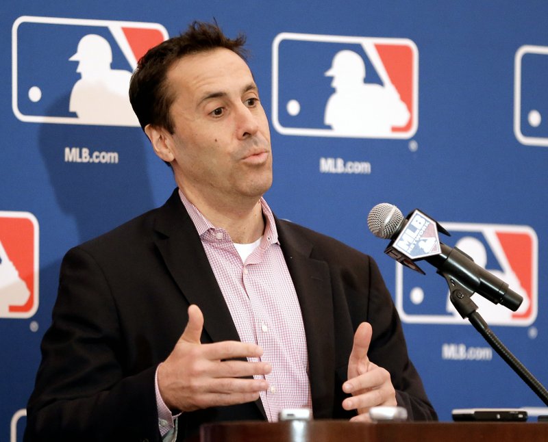 Dan Halem, chief legal officer of Major League Baseball, answers questions during a news conference at the annual MLB baseball general managers' meetings, Wednesday, Nov. 15, 2017, in Orlando, Fla. (AP Photo/John Raoux)