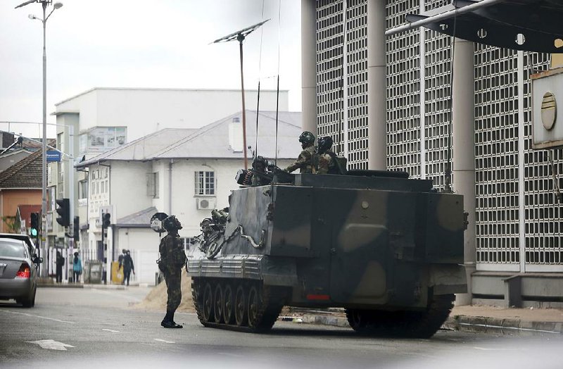A military vehicle sits on a street in Harare, Zimbabwe, on Thursday.