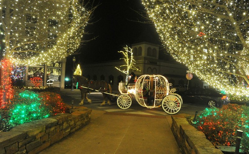 Horse-drawn carriages will return to the Fayetteville square next weekend, but the 2017 Lights of the Ozarks display will be illuminated for the first time today.