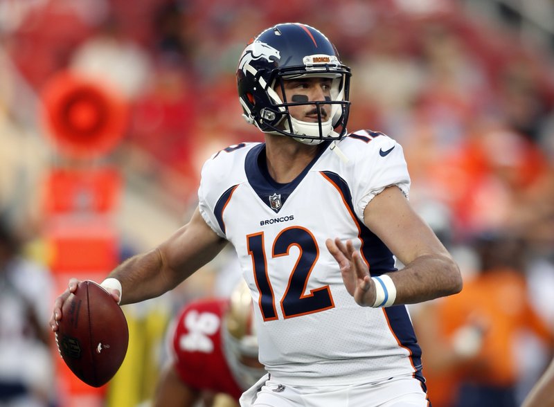 FILE - In this Aug. 19, 2017, file photo, Denver Broncos quarterback Paxton Lynch (12) throws during the first half of a preseason NFL football game against the San Francisco 49ers in Santa Clara, Calif. Unless the Broncos can steer their way out of a season that is skidding out of control, Lynch looks like he will get the starting quarterback gig he has never been able to earn on his own. (AP Photo/D. Ross Cameron, File)