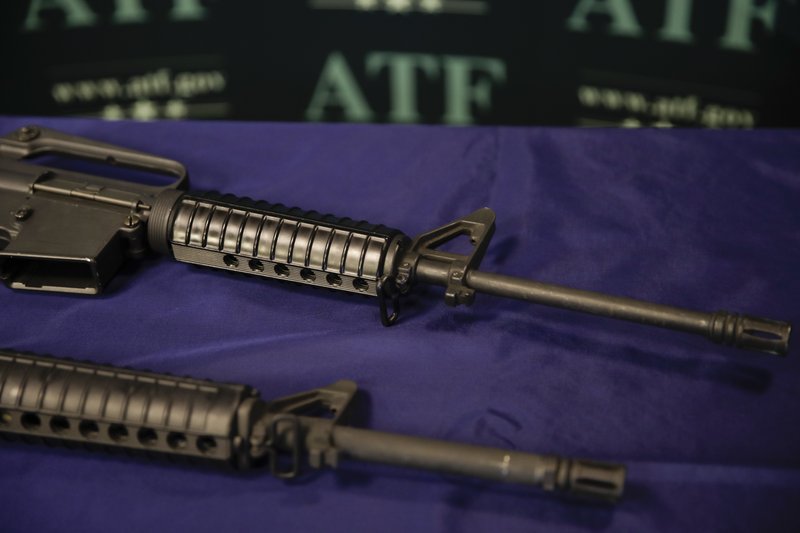 The Associated Press HOMEMADE GUNS: In this Aug. 29 photo, homemade rifles are displayed on a table at an ATF field office in Glendale, Calif. Police say Kevin Neal, who was barred from having guns because of a restraining order, made the two high-powered rifles he used in his shooting rampage in Northern California on Tuesday.