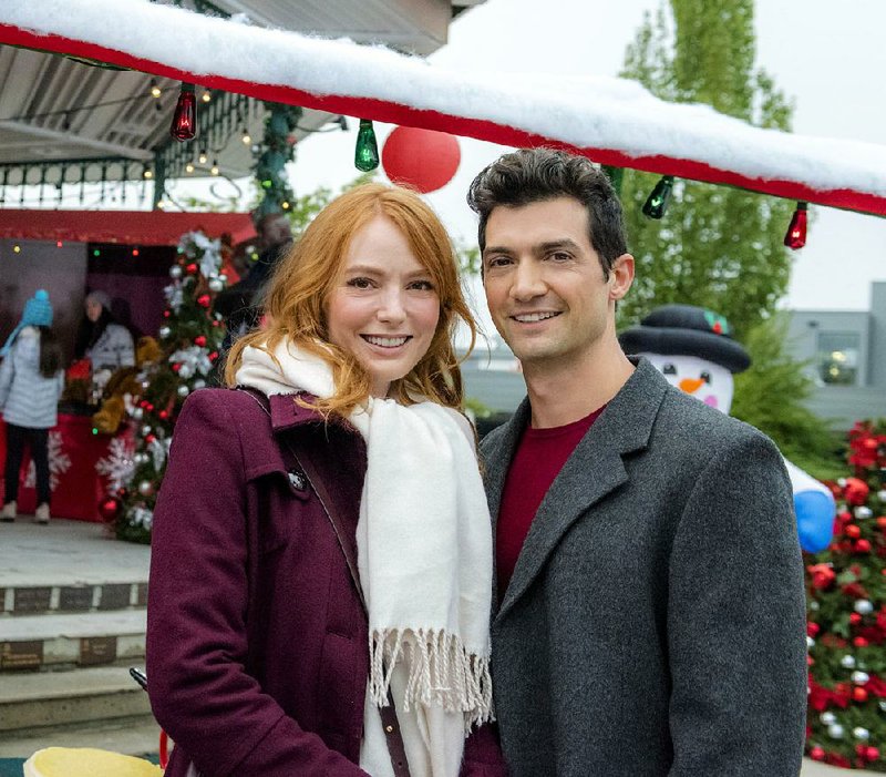 Alicia Witt and David Alpay in Hallmark Channel’s The Mistletoe Inn 