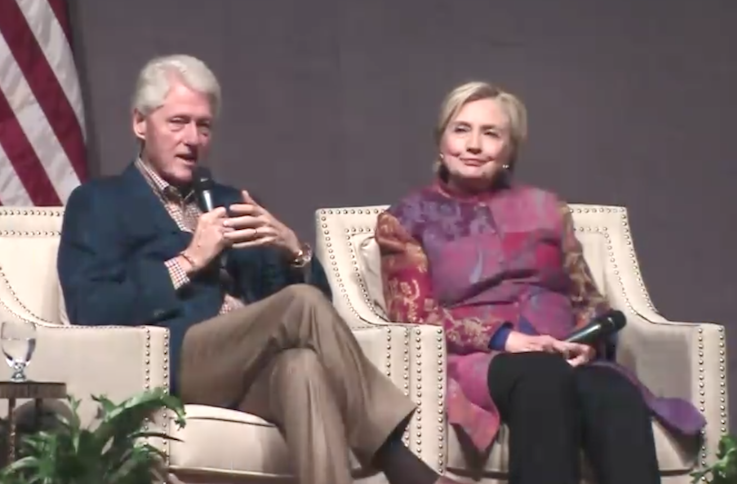 Bill and Hillary Clinton are shown in this screenshot from the Clinton School of Public Service live broadcast of their lecture Saturday night in Little Rock. 