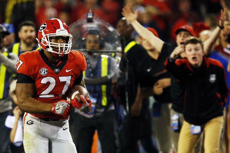 Georgia running back Nick Chubb ran for 151 yards and 2 touchdowns, including a 55-yarder down the sideline in the fourth quarter, to lead the No. 7 Bulldogs to a 42-13 victory over Kentucky in Athens, Ga.  
