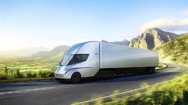 This artist’s rendering provided by Tesla shows the new electric big rig the automaker unveiled Thursday. The vehicles can be reserved with a $5,000 deposit each.