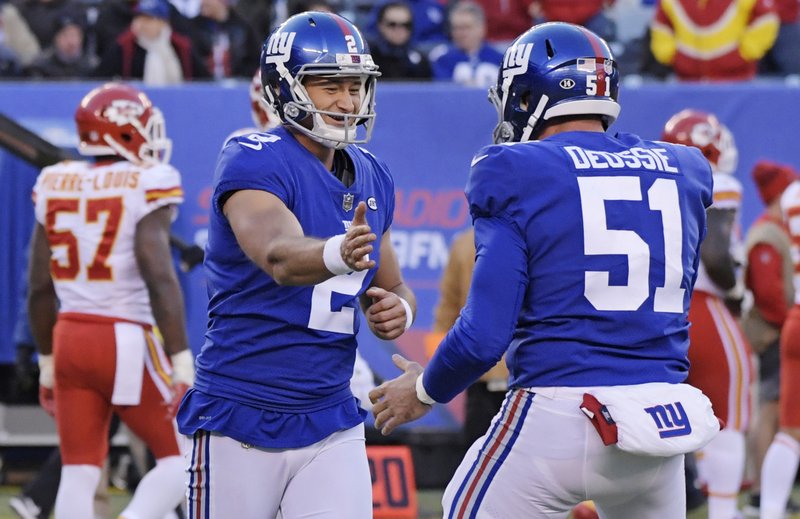 New York Giants kicker Aldrick Rosas (2) celebrates a field goal with teammate Zak DeOssie (51) during the second half of an NFL football game against the Kansas City Chiefs, Sunday, Nov. 19, 2017, in East Rutherford, N.J. 