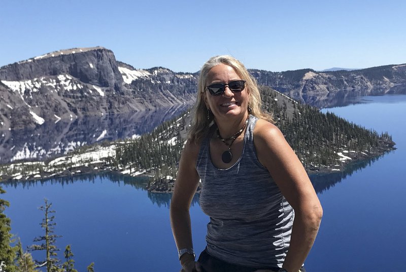 Deb Walter, a teacher at Rogers New Technology High School, pictured above spent the summer exploring the West on a budget of $1,200. She lived out of her car, with her kayak and mountain bike, traveling wherever her whims took her. 