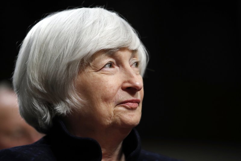 In this Tuesday, Nov. 7, 2017, file photo, Federal Reserve Chair Janet Yellen listens to introductions as she is awarded the Paul H. Douglas Award for Ethics in Government, on Capitol Hill in Washington.