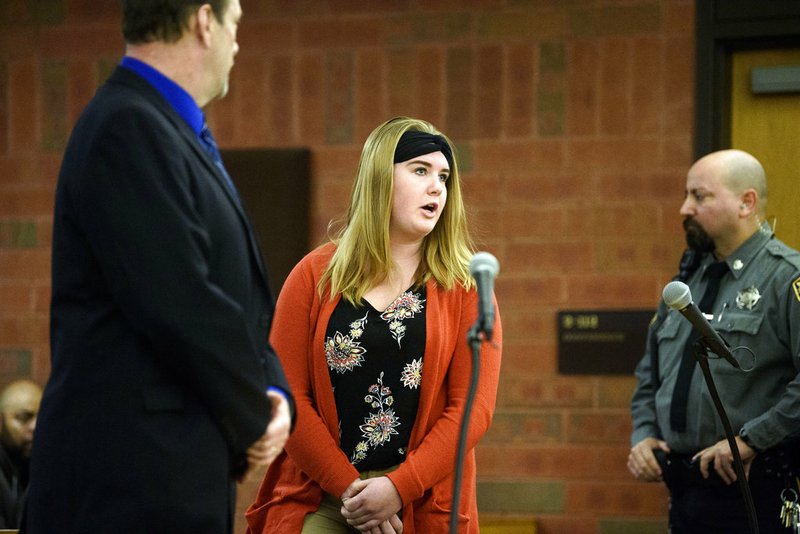 Brianna Brochu, accused of contaminating her black roommate's belongings at the University of Hartford, addresses the court during a hearing Tuesday, Nov. 21, 2017, in Hartford.