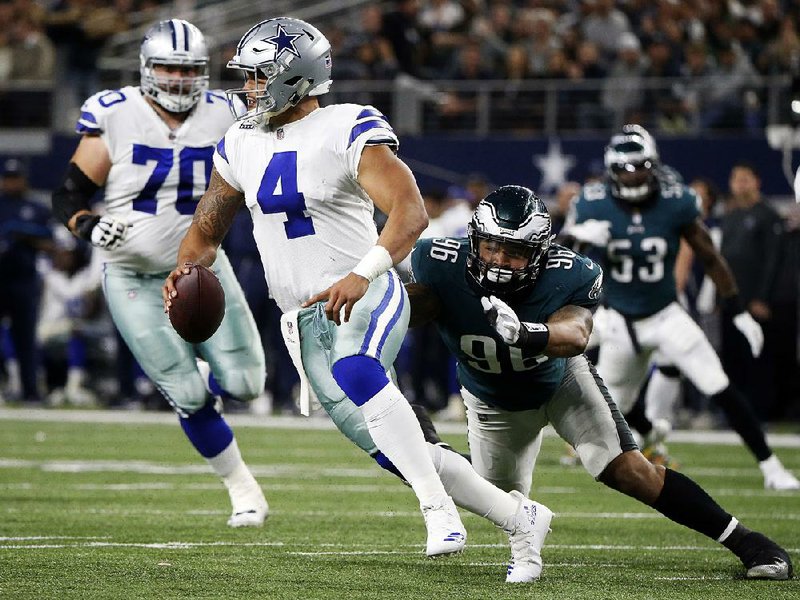 Dallas Cowboys quarterback Dak Prescott is sacked by Derek Barnett of the Philadelphia Eagles during the Cowboys’ 37-9 loss Sunday night. A year after winning a franchise-record 11 consecutive games, Dallas (5-5) is trying to stay in playoff contention. 